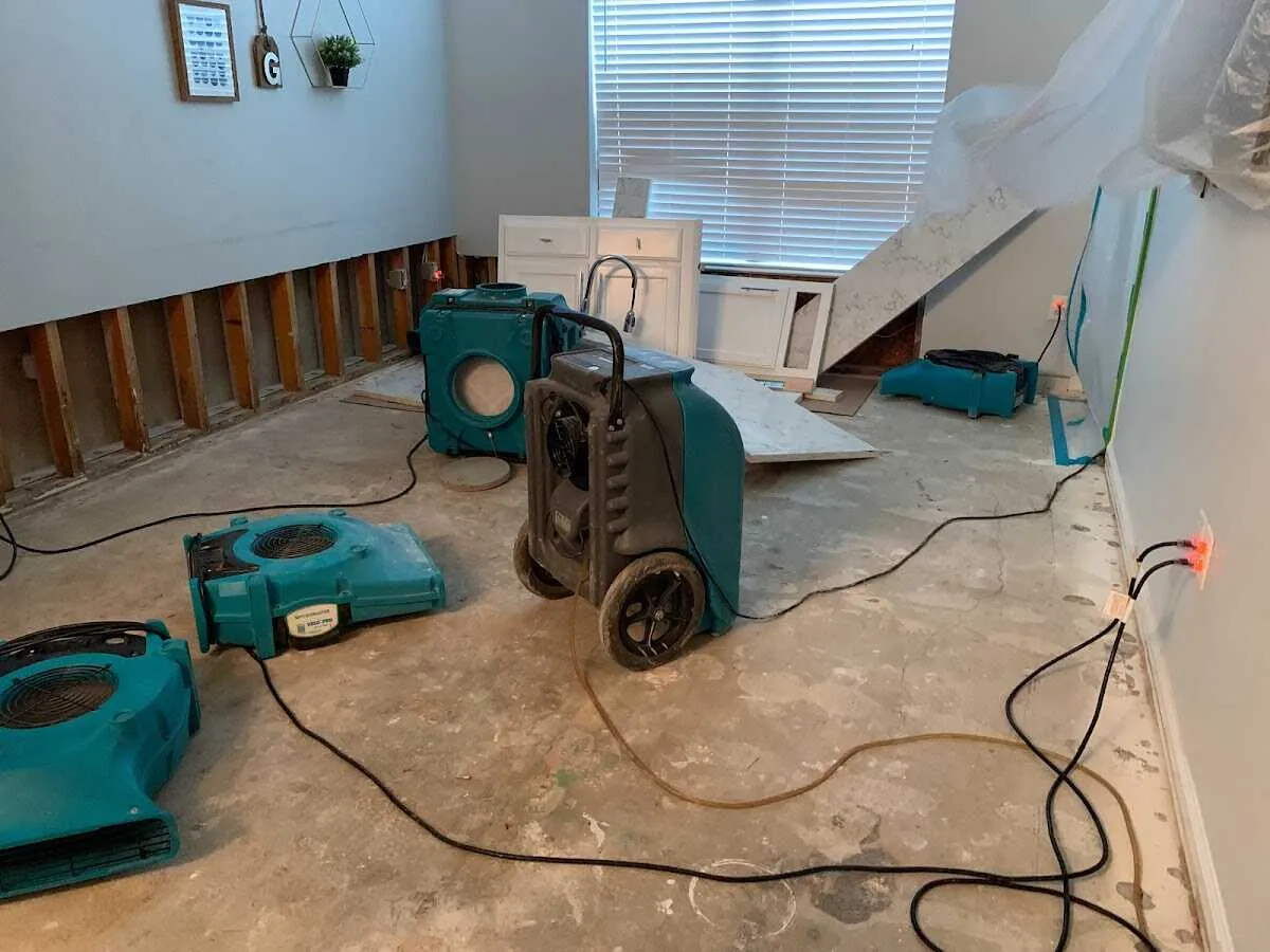 Dehumidifier in flood-cut room for Water Damage Restoration in Moorhead